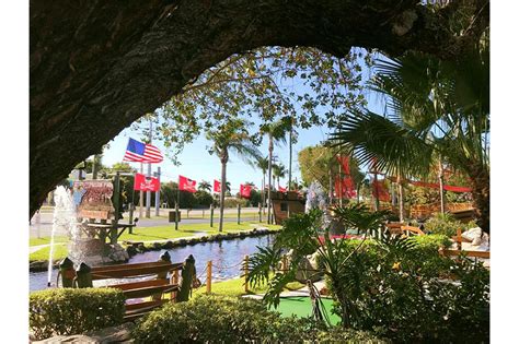 Smugglers cove adventure golf - An 18-hole Adventure style miniature golf course with a live educational alligator exhibit. Open 365 days a year. Explore 18-holes of mini golf while winding through a tropical setting with waterfalls, caves, and 25 real American Alligators!